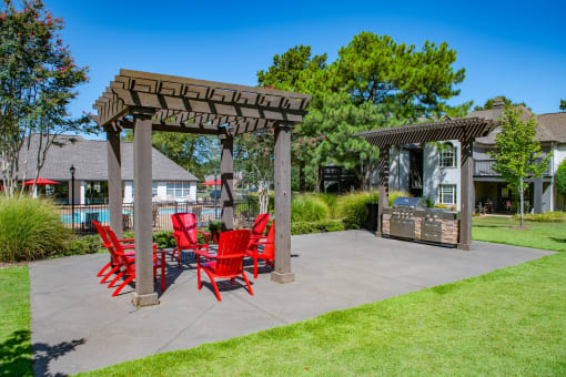 Patio with Red Chairs at The Addison at Collierville Apartments, Tennessee, 38017