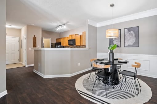 Round Dining Table at Sugarloaf Crossing Apartments, Lawrenceville