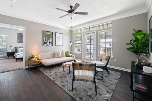 Living Room with Patio Door at Sugarloaf Crossing Apartments, Georgia, 30046