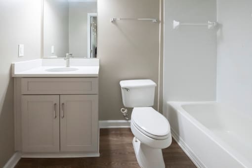 Bathroom with White Toilet at Sugarloaf Crossing Apartments, Lawrenceville, GA, 30046