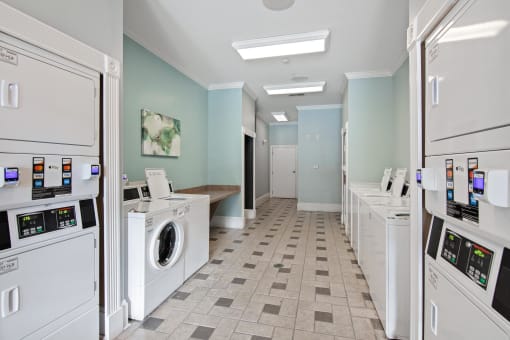 laundry center washing machine  at The Berkeley Apartments, Georgia, 30096