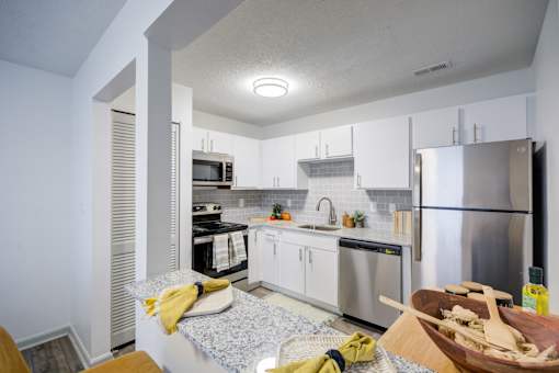 Kitchen with Modern Appliances at The Waters at Chenal Apartments, Little Rock, 72211