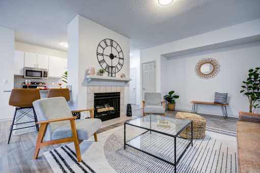 Living Room with Fireplace at The Waters at Chenal Apartments, Little Rock, AR