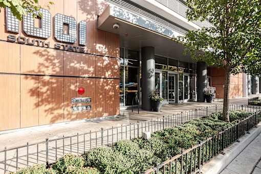 The front of a building with the words "South State" on it.