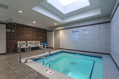 Indoor hot tub with seating area
