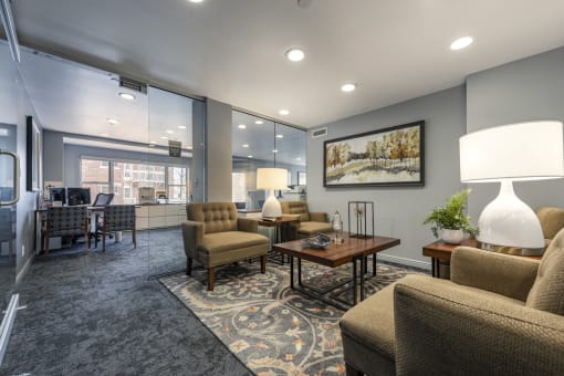 Office area with seating and a view of the leasing office desks
