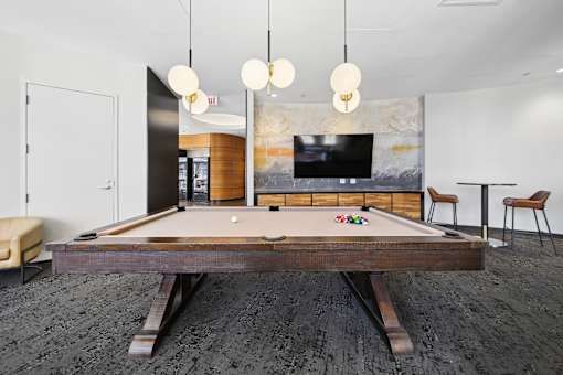 Chicago apartment game room with pool table and lounge