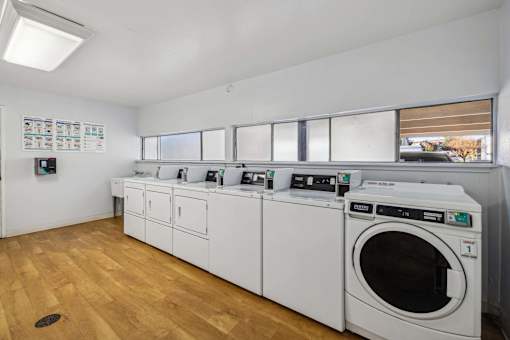 A laundry room with a washer and dryer.