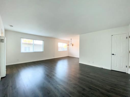 Spacious Living Room with Large Windows and Hardwood Flooring at 2120 Valerga in Belmont, CA