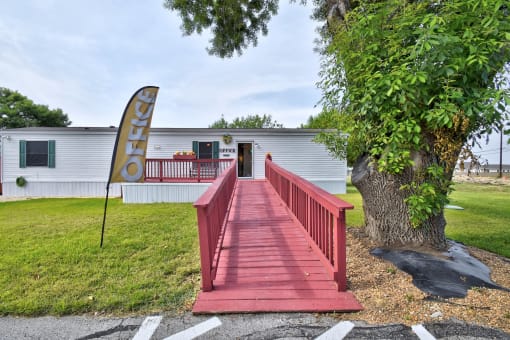 Red bridge in front of office at Country Oaks, San Antonio, TX, 78253
