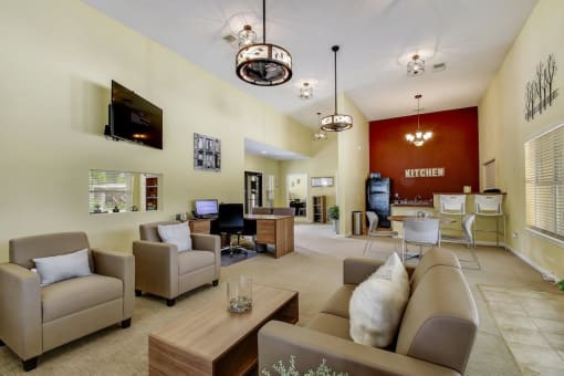 a living room filled with furniture and a flat screen tv