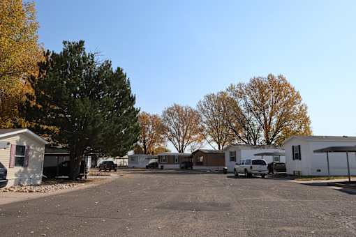 a parking lot full of mobile homes in a trailer park at Circle Park, Cheyenne