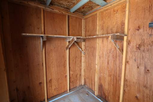 the inside of a wood walled room with wooden walls and wooden beams at Circle Park, Cheyenne