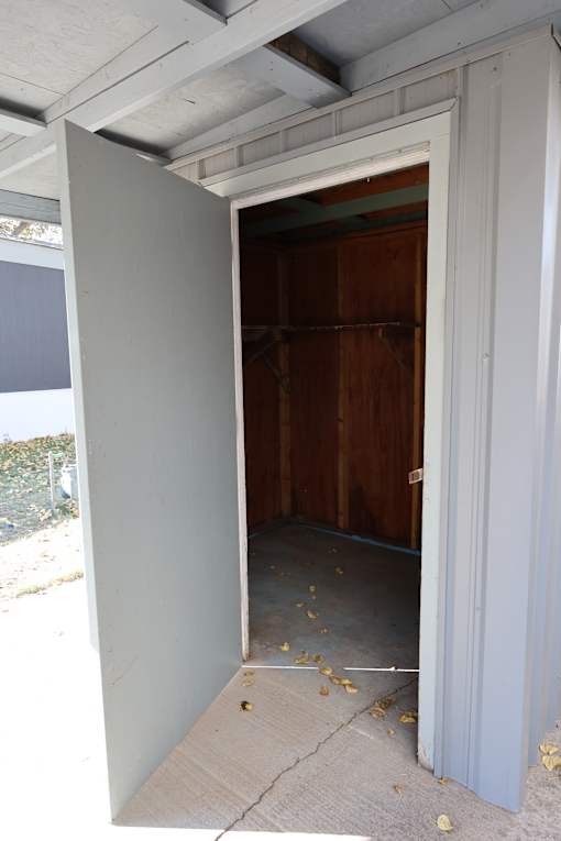 an open door into a room with a wood closet at Circle Park, Cheyenne, Wyoming