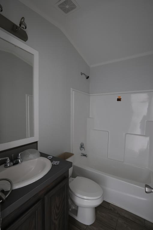 a bathroom with a toilet and a sink and a bath tub at Circle Park, Cheyenne, 82007