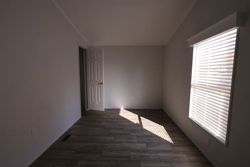 an empty room with a window at Circle Park, Cheyenne