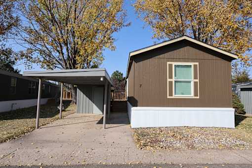 the front of a house with a garage and a driveway at Circle Park, Cheyenne