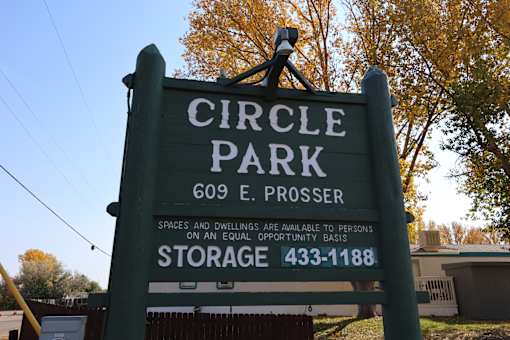 the sign for circle park in front of a tree at Circle Park, Cheyenne, 82007