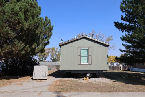 the exterior of a tiny house on a trailer at Kimberly Village, Cheyenne, WY, 82007