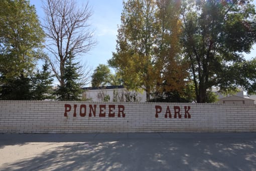 a brick wall with the words pioneer park on it at Pioneer Park, Green River