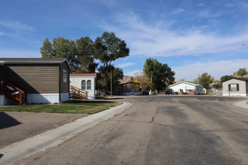 a street in a neighborhood with houses and trees at Pioneer Park, Green River