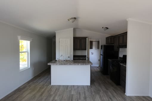 a view of a kitchen from the living room at Pioneer Park, Green River, WY