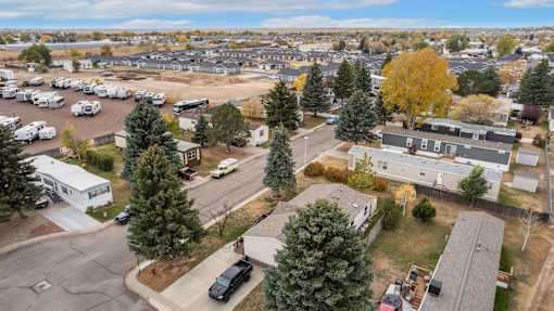 an aerial view of a neighborhood with houses and cars parked at Kimberly Village, Cheyenne
