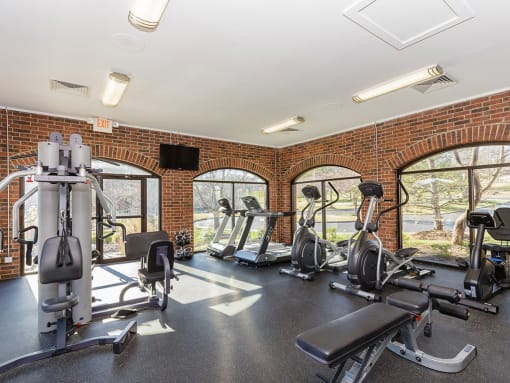 Fitness center with modern equipment at Reflection Cove Apartments in Manchester