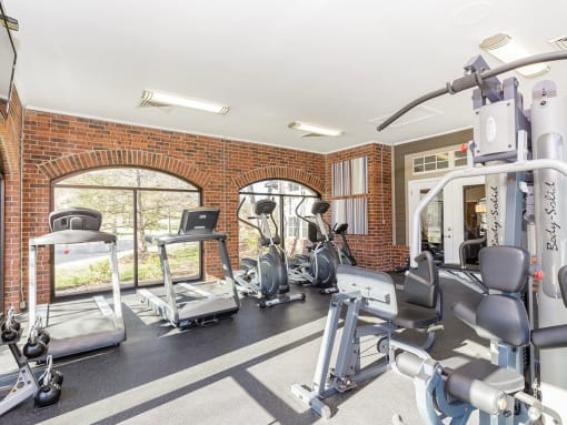 24-Hour multi-level cardio and weightlifting center at Reflection Cove Apartments in Manchester, Missouri