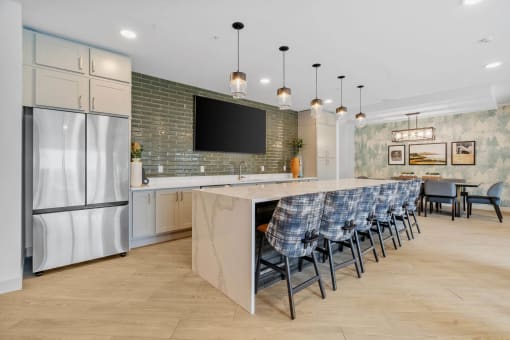 Clubroom with Kitchen Bar at The Aurilla, Cottage Grove, MN