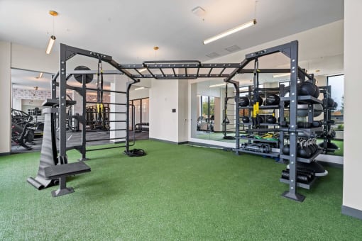 the home has a gym with weights and equipment