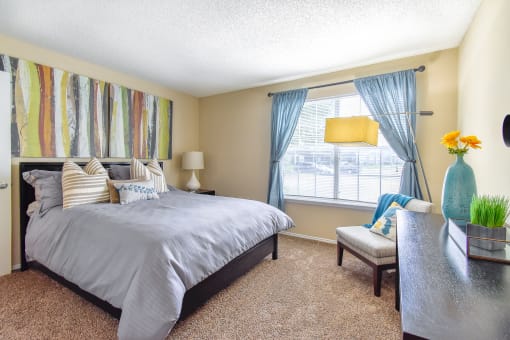 our apartments offer a bedroom with a king size bed at Riverset Apartments in Mud Island, Memphis, TN
