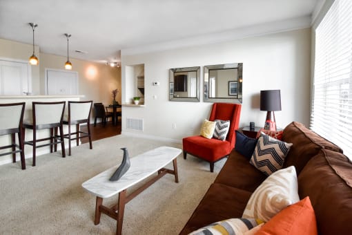 Cozy Living Room with Kitchen View at Kenyon Square Apartments, Westerville, Ohio