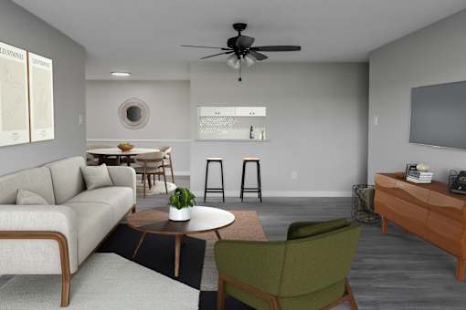A living room with a couch, chair, and a table with a plant on it.