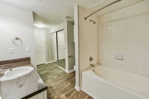 Graves Floorplan, unfurnished bathroom with closet and tub