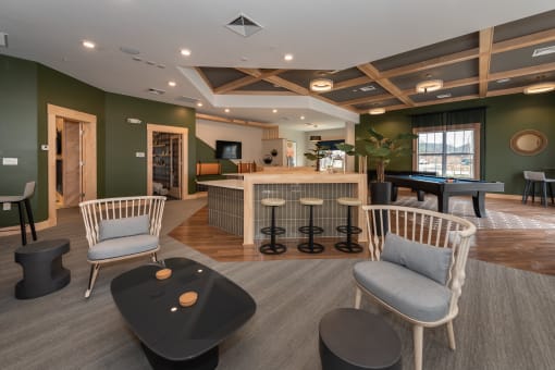 a resident clubhouse with a pool table and bar at The Bend Arbordale, Williamsburg