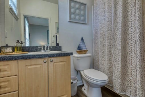 Bathroom with a Toilet at Rivertree Apartments, Riverview