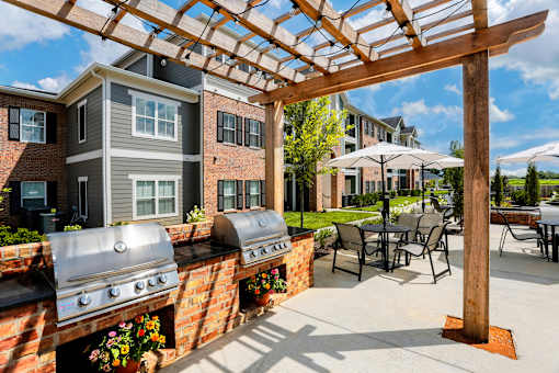 our apartments have a large patio with a grill and tables at Annandale Apartment Homes, Murfreesboro, 37128