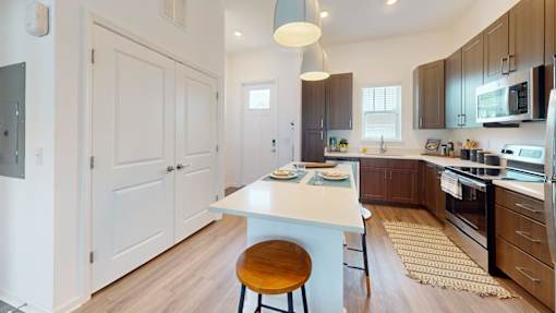 Kitchen with Wooden Floors at Artesia at Lakewood Ranch Apartments, Florida
