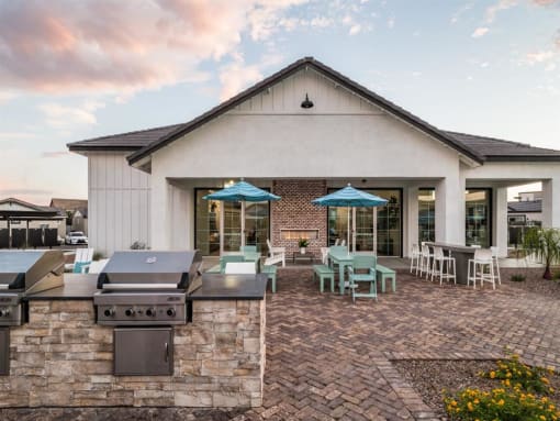 grills on patio at leasing office at Onyx at Westgate Apartments, Glendale, 85305