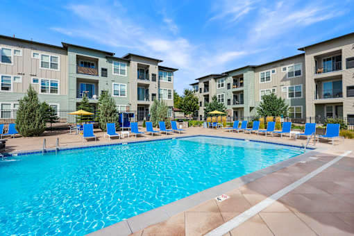 Swimming Pool with Relaxing Area at WestLink at Oak Station Apartments, Lakewood
