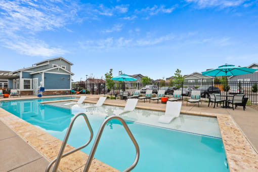 take a dip in the resort style pool at The Villas at Prairie Center, Brighton, Colorado