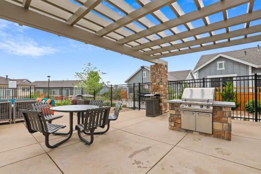 the patio at the enclave at woodbridge apartments in sugar land, tx at The Villas at Prairie Center, Colorado, 80601