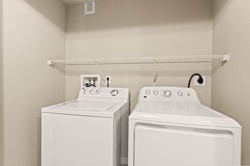 a washer and dryer in a laundry room