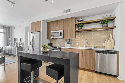 a kitchen and dining area at 8000 Uptown Apartments, Broomfield