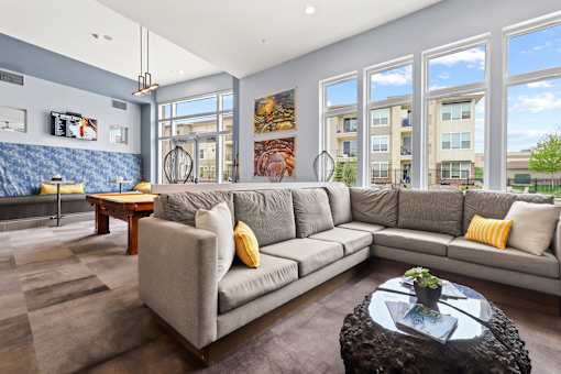 couch in clubhouse at Westlink at Oak Station Apartments in Lakewood, CO