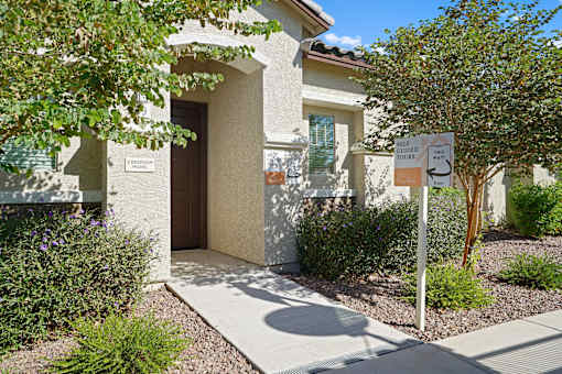 a house with a no parking sign in front of it at Soleil at Canyon Trails Apartments, Goodyear, Arizona