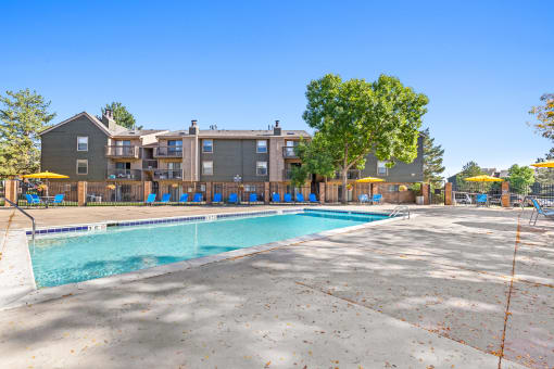 our apartments offer a swimming pool with our building in the background at Silver Reef Apartments, Colorado, 80228