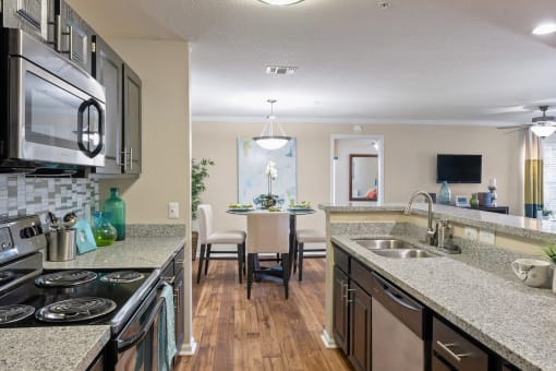 the preserve at ballantyne commons apartments kitchen and dining area at 150 Summit, Birmingham, 35243