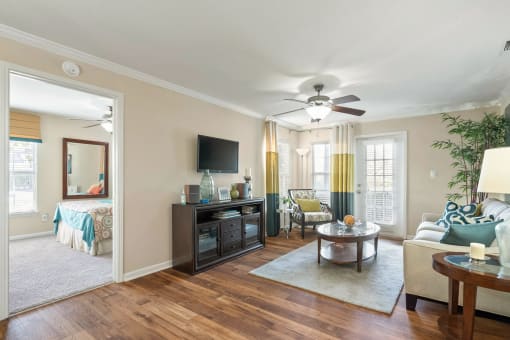 a living room with a ceiling fan and a couch at 150 Summit, Alabama, 35243